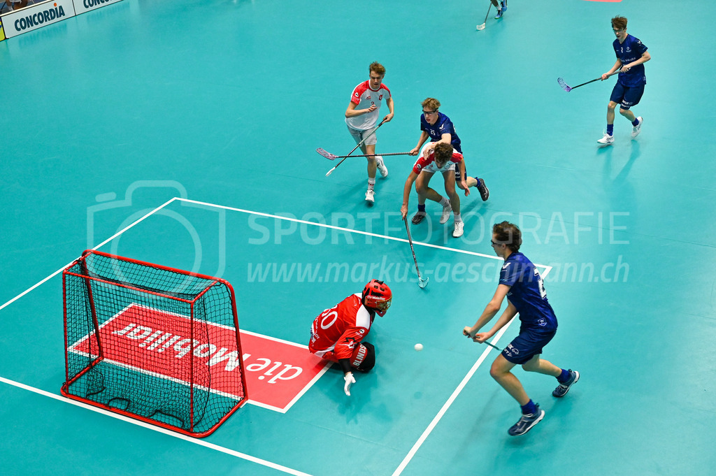 Switzerland U19 vs Finland U19 - 3. February 2024 | Switzerland U19 vs Finland U19
U19 Men International Matches in Switzerland
GoEasy Arena, Siggenthal Station
Finland defender #20 Ilmo Leino scoring against Switzerland goalie #30 Ilja Brunner.
Credit: Markus Aeschimann | <a href="https://www.markus-aeschimann.ch">Sportfotografie Markus Aeschimann</a> | <a href="https://www.instagram.com/sportfotografie.aeschimann">@sportfotografie.aeschimann</a> - Realisiert mit Pictrs.com