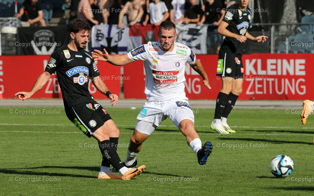 A_LUI_120823_0002 | SPORT,FUSSBALL,ADMIRAL BUNDESLIGA STURM GRAZ-AUSTRIA KLAGENFURT IM BILD:VESEL DAMAKU (STURM GRAZ) UND TURGAY GEMICIBASI (KLAGENFURT) FOTOLUI/MW