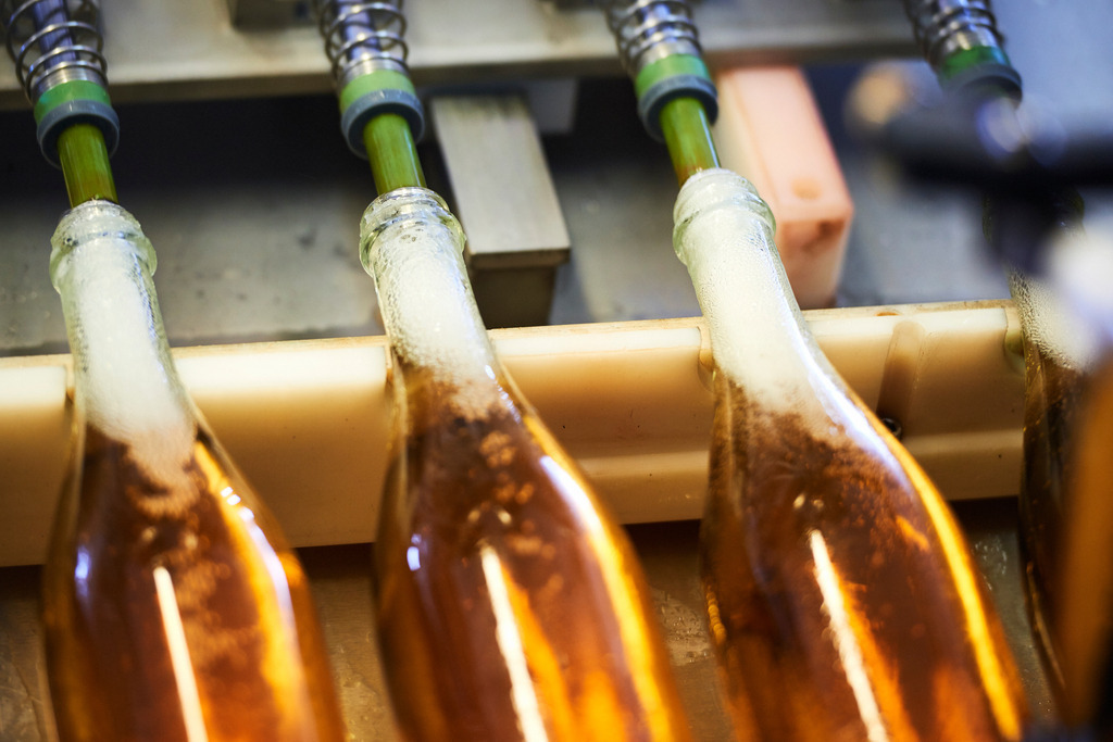 Sektkellerei Szigeti | Gols, Austria - February 19, 2018: Sektkellerei Szigeti; nach dem Degorgieren wird hier die fehlende Menge an Sekt, mit einer kleinen Menge „Liqueur d’expedition“ aufgefüllt, die sogenannte die Dosage. - Realisiert mit Pictrs.com