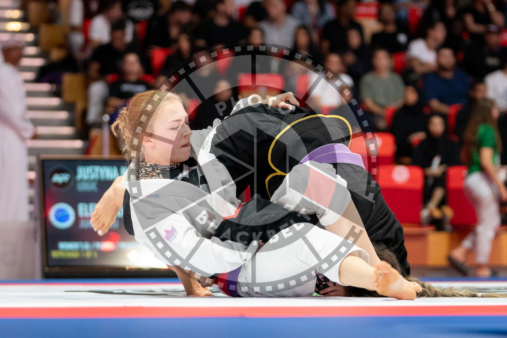 20231109PBB6273 | Fighters compete during the AJP World Professional Championship in the Mubadala Arena in Abu Dhabi, Arab United Emirates, on November 9, 2023.
