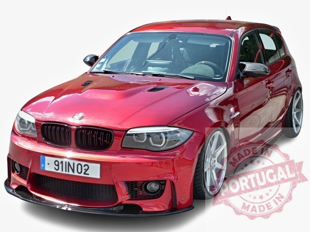Red BMW 1 series showcasing tuning modifications on white background | Customized red BMW 1 series showcasing tuning modifications, parked on white background - Realisiert mit Pictrs.com
