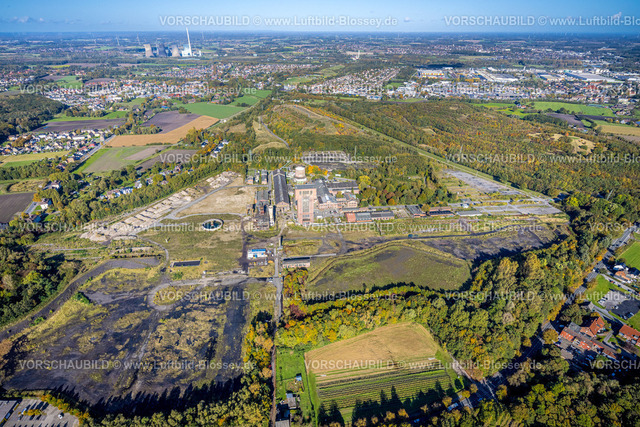 Hamm241007682 | Luftbild, ehemaliges Bergwerk Ost Heinrich Robert mit dem Hammerkopfturm, Neugestaltung zum CreativRevier Hamm, Halde Humbert, Fernsicht und blauer Himmel mit Wolken, Stadtbezirk Pelkum, Hamm, Ruhrgebiet, Nordrhein-Westfalen, Deutschland