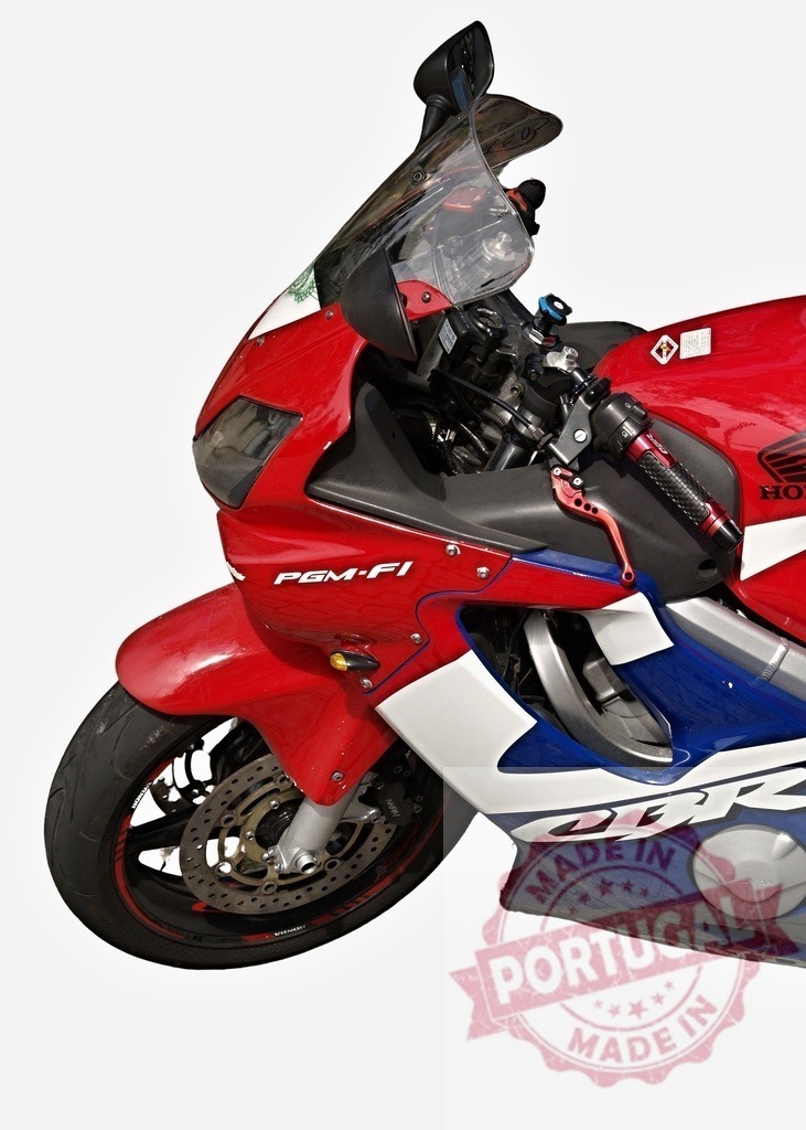 Honda CBR Motorcycle Displaying Power and Speed | Red, white and blue Honda CBR motorcycle ready for a thrilling ride - Realisiert mit Pictrs.com