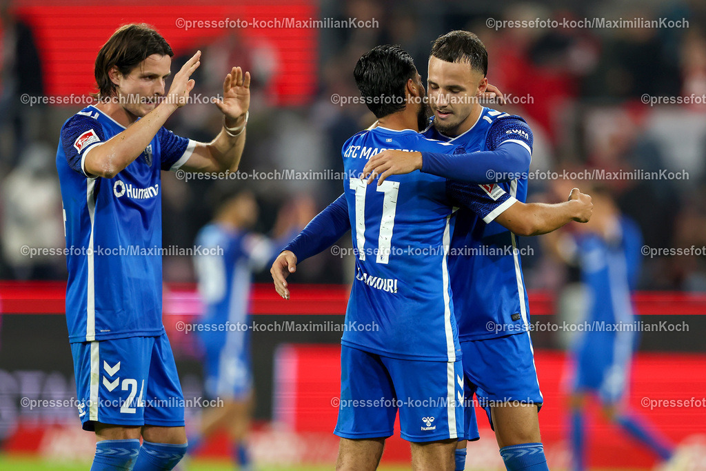 Koe14092401059 | 14.09.2024, 2. Fußball Bundesliga, 1. FC Köln - 1. FC Magdeburg, RheinEnergieSTADION, Saison 2024 2025: Freude bei der Mannschaft von magdeburg nach dem 2:1 Sieg Jean Hugonet (1.FC Magdeburg #24) und Mohammed El Hankouri (1.FC Magdeburg #11) und Falko Michel (1.FC Magdeburg #21)DFB regulations prohibit any use of photographs as image sequences and or quasi-video.