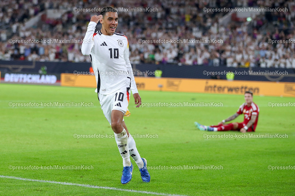 DFB07092401062 | 07.09.2024, Düsseldorf, UEFA Nations League, Deutschland – Ungarn, Merkur Spielarena, Division A, 2024/2025, Gruppe 3: Jamal Musiala (GER #10) trifft zum 2:0. Torjubel nach dem Treffer. DFB regulations prohibit any use of photographs as image sequences and or quasi-video.