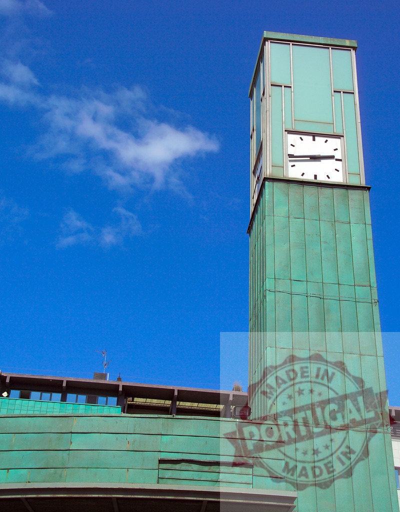 Helsinki Central Station clock tower against blue sky. Spain - Bilbao | Detailed view of the art nouveau clock tower at Helsinki Central Station - Realized with Pictrs.com