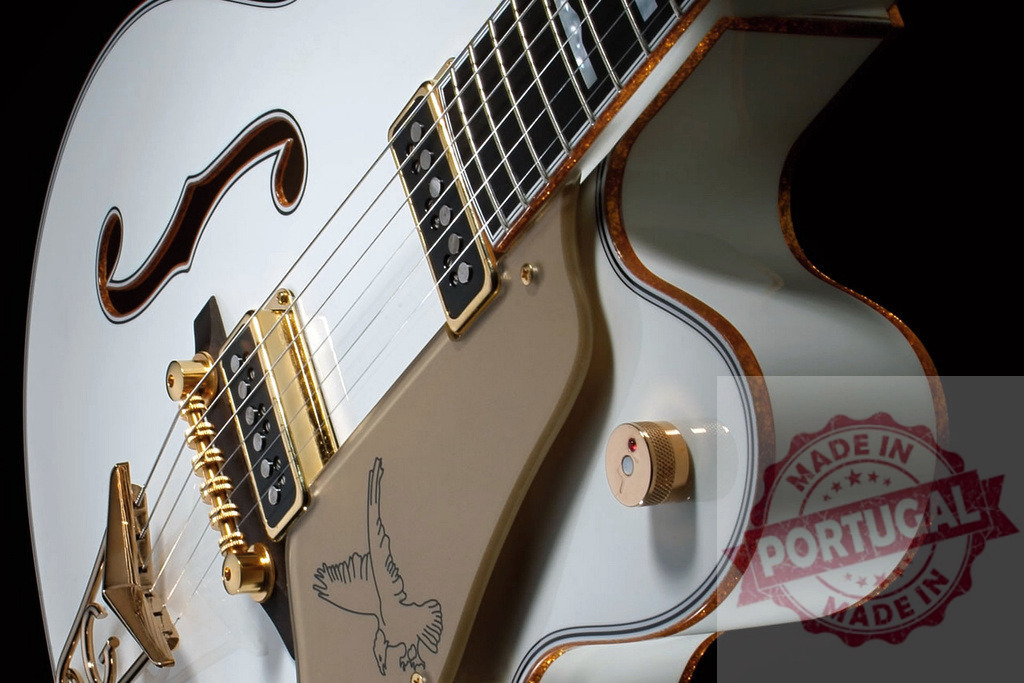 White electric guitar with golden details showing its strings and body | Close-up of a white electric guitar with golden details, highlighting the strings, body, and craftsmanship - Realized with Pictrs.com