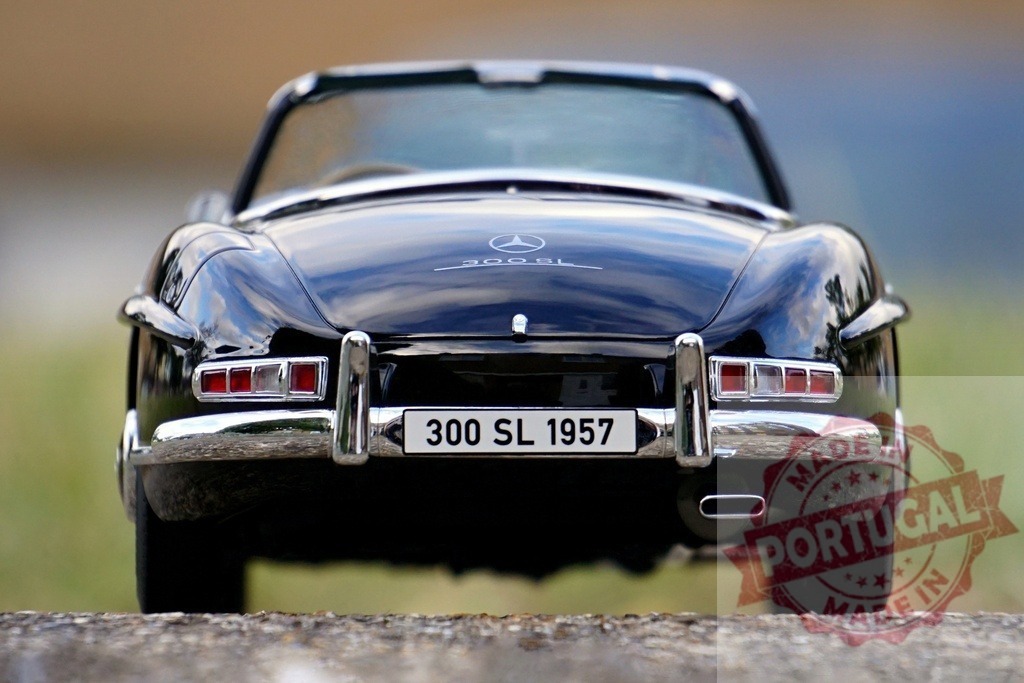 Mercedes-Benz 300 SL vintage model rear view | Mercedes-Benz 300 SL diecast model showcasing classic design and details on ground level - Realized with Pictrs.com