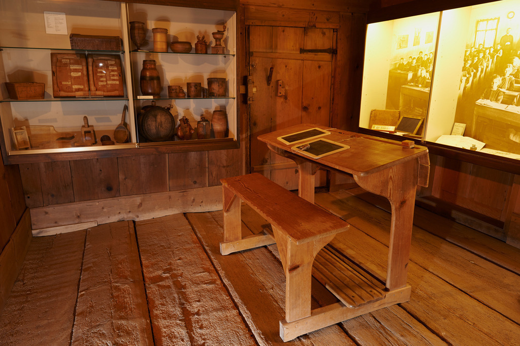 Alte Schulbank | Schwarzenberg, Austria - November 04, 2013: Heimatmuseum Schwarzenberg im Bregenzerwald;  Alte Schulbank. - Realisiert mit Pictrs.com