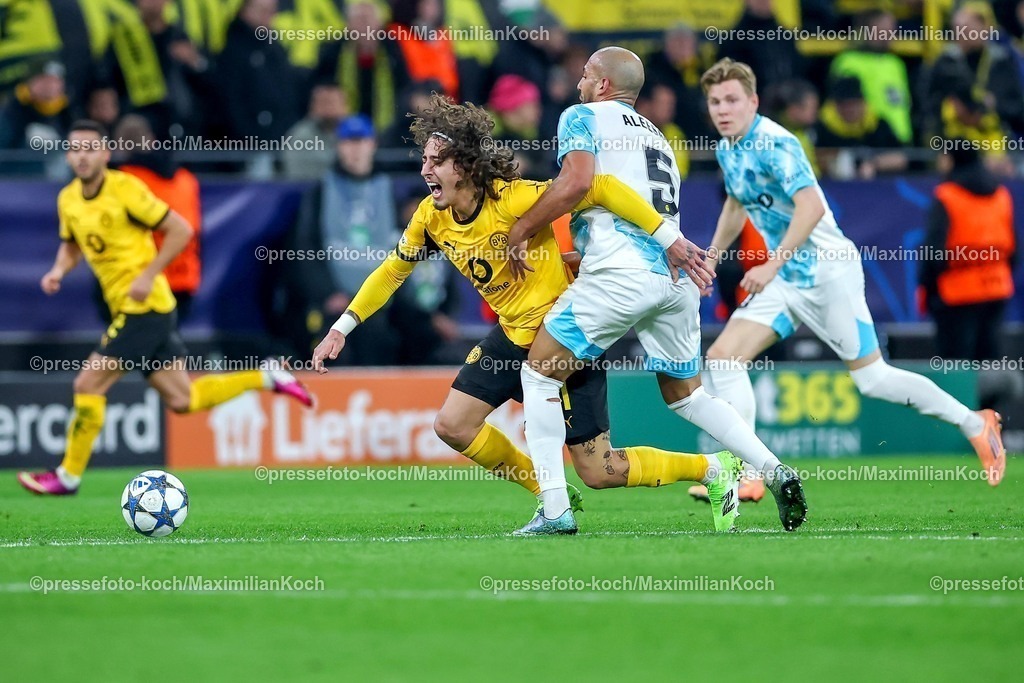 UCL10122501070 | 10.12.2025, Fußball, UEFA Champions League, Borussia Dortmund - FK Bodö/Glimt, BVB Stadion, 5. Spieltag, Saison 2025 2026: Fabio Silva (BVB #21) im Zweikampf gegen  Haitam Aleesami (Bodo Glimt #05)  Regulations prohibit any use of photographs as image sequences and or quasi-video.