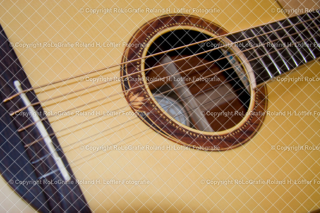 Gitarre-01 | Detail einer Gitarre - Realisiert mit Pictrs.com