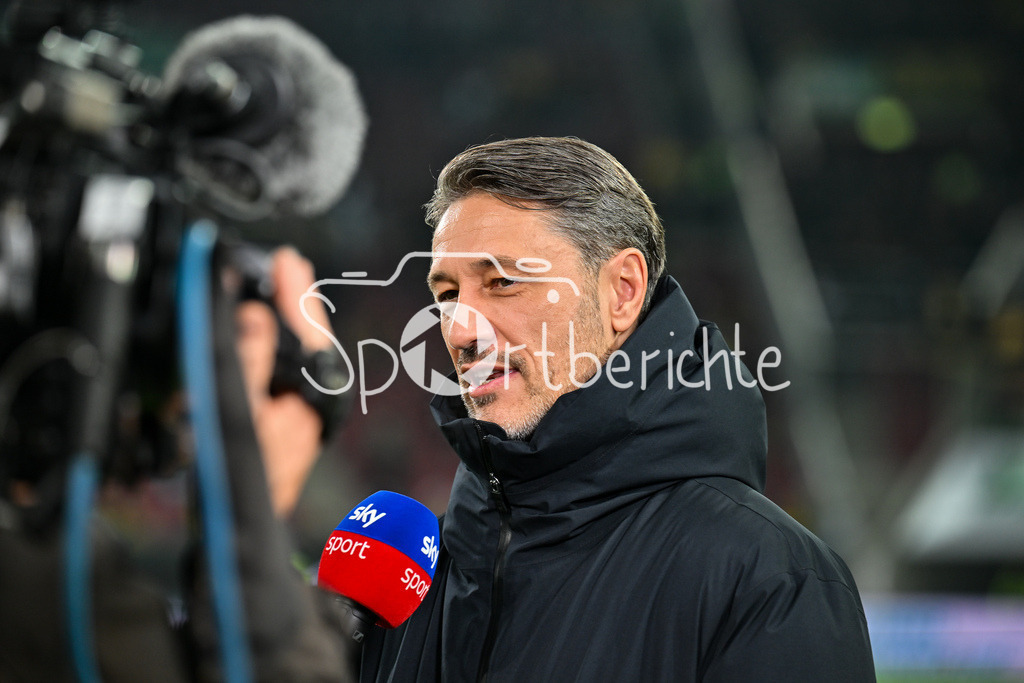 FC Augsburg - Borussia Dortmund | AUGSBURG, GERMANY - OCTOBER 31: Niko KOVAC headcoach Borussia Dortmund, interview, sky, happy, before the bundesliga match between FC Augsburg vs. Borussia Dortmund on matchday 9 at WWK Arena on October 31, 2025 in Augsburg, Germany / DFL REGULATIONS PROHIBIT ANY USE OF PHOTOGRAPHS AS IMAGE SEQUENCES AND/OR QUASI-VIDEO