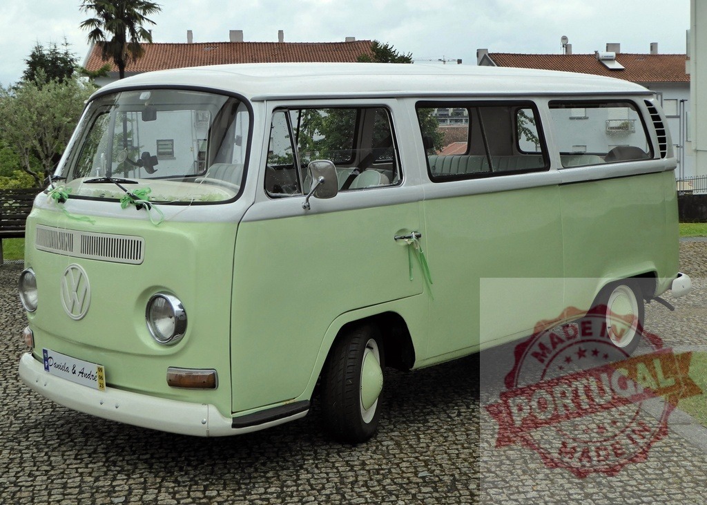 Volkswagen T1 van decorated for a wedding celebration | Vintage Volkswagen T1 van parked on cobblestones, decorated with green ribbons for a special event - Realized with Pictrs.com