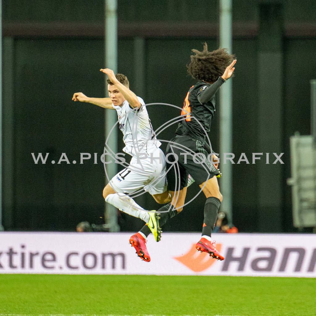 LASK Linz vs Manchester United | Linz, AUSTRIA 12.03.20 - SOCCER-EURO LEAGUE, LASK Linz vs Manchester United  Image shows: Dominik Reiter (LASK) and Tahith Chong (MANU)
Photo: Sportmediapics.com/ Andreas Willdoner