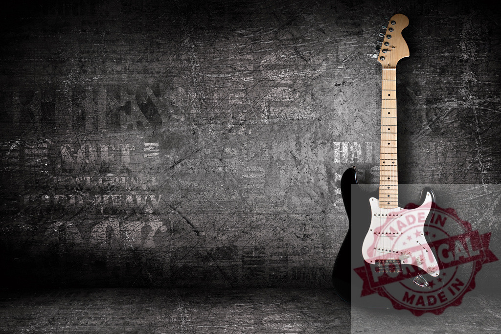 Electric guitar leaning against concrete wall in dark room with typography | Black Fender Stratocaster electric guitar leaning against grungy concrete wall - Realized with Pictrs.com