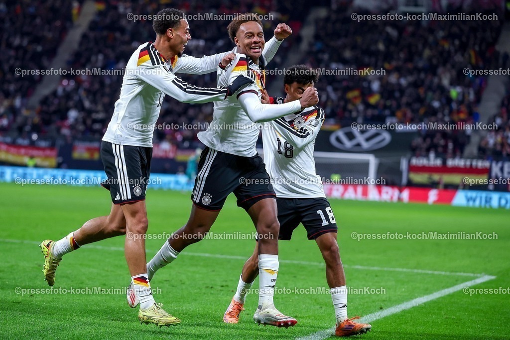 DFB17112503069 | 17.11.2025, Fußball, Länderspiel, WM-Qualifikation Europa, Deutschland - Slowakei, Red Bull Arena (Leipzig), 10. Spieltag, Saison 2025 2026: Torjubel nach dem Tor zum 6:0 durch Torschütze Forzan Assan Ouedraogo (GER #09)  zusammen mit Felix Nmecha (GER #13) Nathaniel Brown (GER #18)   Regulations prohibit any use of photographs as image sequences and or quasi-video.