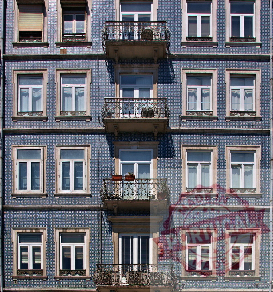 Lisbon building facade featuring azulejo tiles and balconies | European architecture showing traditional patterned azulejo tiles on a building exterior - Realized with Pictrs.com