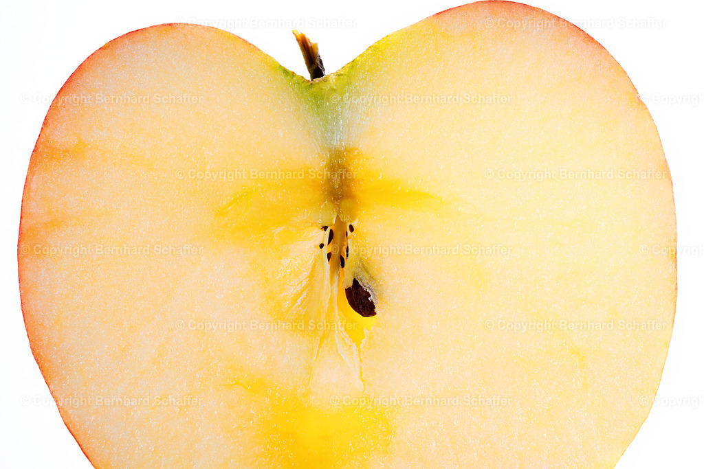 Apfelschnitte im Licht | Nahaufnahme einer Apfelscheibe im Durchlicht. - Realisiert mit Pictrs.com