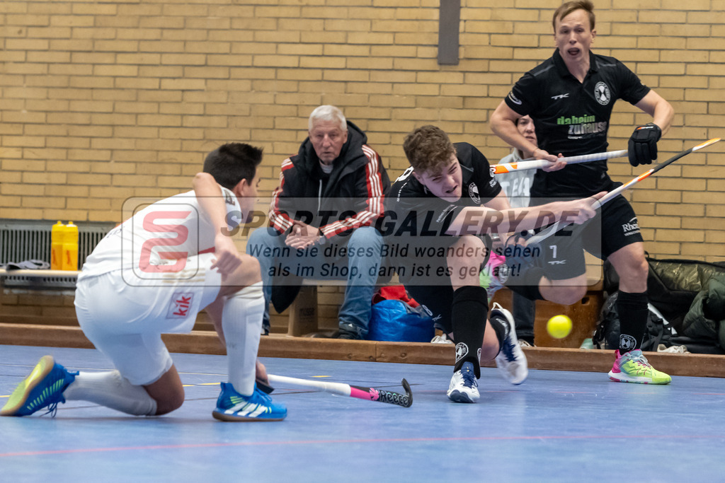 SFE_20240106_0052 | Neuss, Deutschland, 06.01.2024: Philipp Weide (SW Neuss), Florian Adrians (Rot-Weiss Köln) in Aktion waehrend des Spiels der Halle 1. Bundesliga Herren zwischen SW Neuss vs Rot-Weiss Köln im Stadionhalle (SW Neuss) am 06.01.2024 in Neuss, Deutschland. (Foto von Stephan Fehrmann)

Neuss, Germany, 06.01.2024: Philipp Weide (SW Neuss), Florian Adrians (Rot-Weiss Köln) in action during the game of Halle 1. Bundesliga Herren between SW Neuss vs Rot-Weiss Köln in Stadionhalle (SW Neuss) at 06.01.2024 in Neuss, Deutschland. (Foto von Stephan Fehrmann)