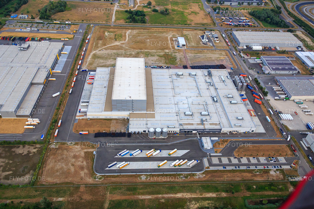 Luftbild: Pfälzer Erfrischungsgetränke GmbH in Wörth am Rhein im Bundesland Rheinland-Pfalz in Deutschland. Foto: IMG_083772.jpg vom 24.07.2015 durch Werner Riehm/FLY-FOTO.deMEG Gruppe - MEG Gruppe