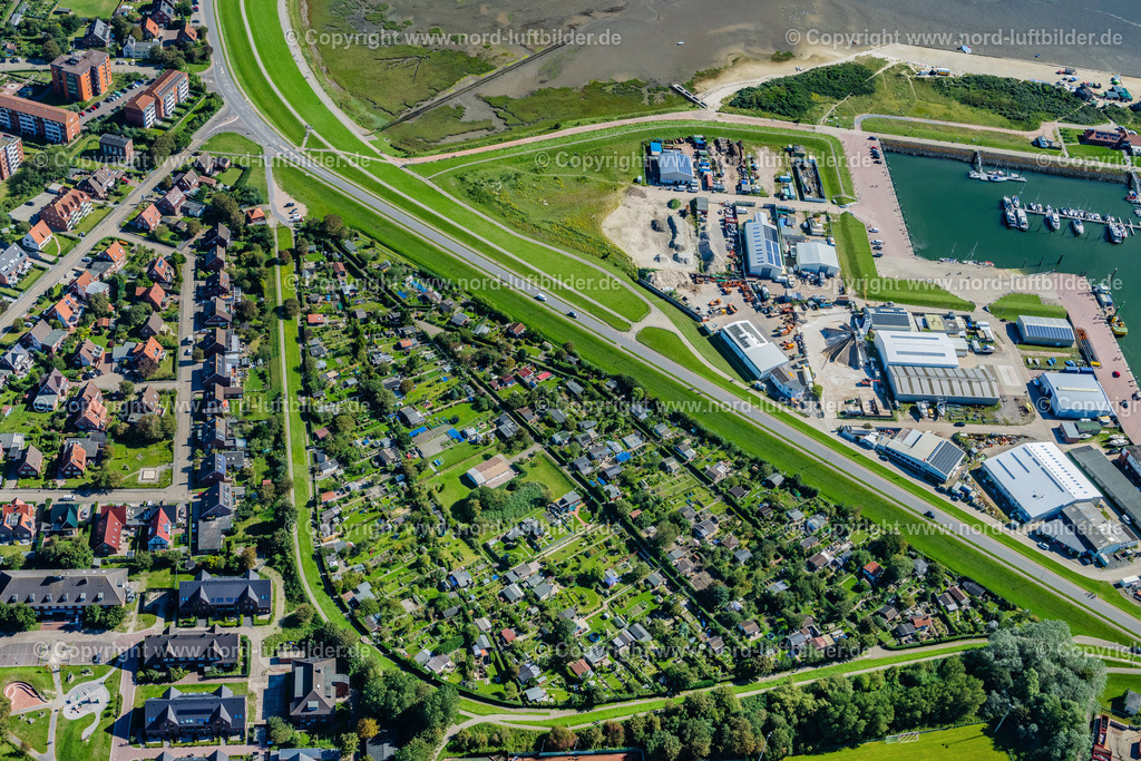 Norderney_Kleingarten_Schlickdreieck_ELS_7043050923 | NORDERNEY 05.09.2023 Kleingartenanlagen des Vereins - der Laubenkolonie " Schlickdreieck " auf der Insel Norderney im Bundesland Niedersachsen, Deutschland. // Allotment gardens of the association - the arcade colony "Schlickdreieck" on the island of Norderney in the state of Lower Saxony, Germany. Foto: Martin Elsen