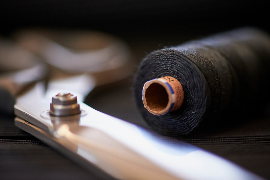 Juppo und Emlmachare | Bezau, Austria - March 09, 2016: Juppo und Emlmachare; schwarzer Zwirn und Schneiderschere. - Realisiert mit Pictrs.com