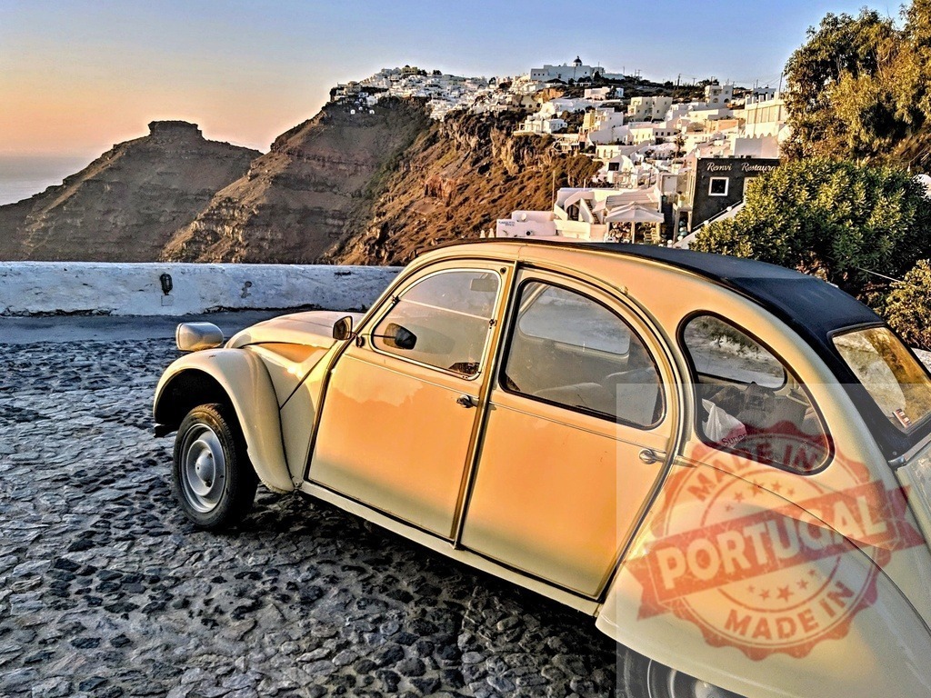 Citroen 2CV car parking on Imerovigli cobblestone street | Vintage Citroen 2CV car parking on a cobblestone street in Imerovigli, Santorini at sunset - Realisiert mit Pictrs.com