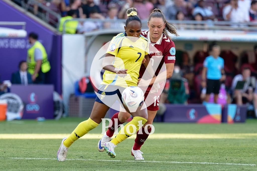 Denmark v Sweden - UEFA Women's EURO 2025 Group C | GENEVA, SWITZERLAND - JULY 4: Madelen Janogy of Sweden (L) and Janni Thomsen of Denmark (R) fight for possession  during the UEFA Womens EURO 2025 Group C match between Denmark and Sweden at Stade de Geneve on July 4, 2025 in Geneva, Switzerland. (Photo by Giuseppe Velletri/Sports Press Photo/Getty Images)