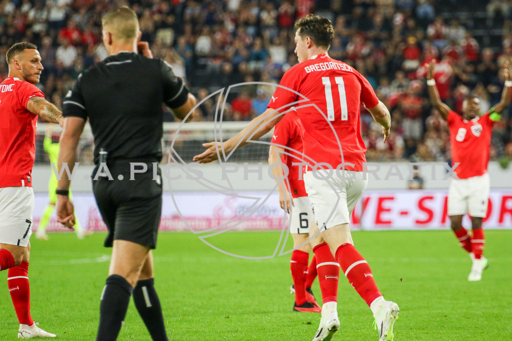 AUSTRIA vs MOLDAVIA | LINZ,AUSTRIA,07.SEPT.23 - INT.SOCCER - AUSTRIA vs MOLDAVIA.  Image shows the rejoicing of Michael Gregoritsch (AUT) and David Alaba (AUT). Photo: Sportmediapics.com/ Andreas Willdoner