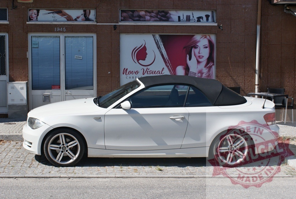 BMW 1 series white convertible parked street | White BMW 1 series convertible with a black soft top parked on a street near a hair salon - Realisiert mit Pictrs.com