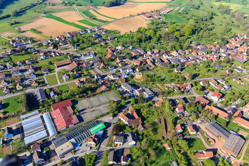 Aerial view: Salle des Fêtes and Maison de la Musique in Preuschdorf in the state Bas-Rhin, France. – Photo: IMG_099351.jpg taken on 04/30/2017 by Werner Riehm/FLY-FOTO.com – Resolution of the original: 5472 x 3648 px
