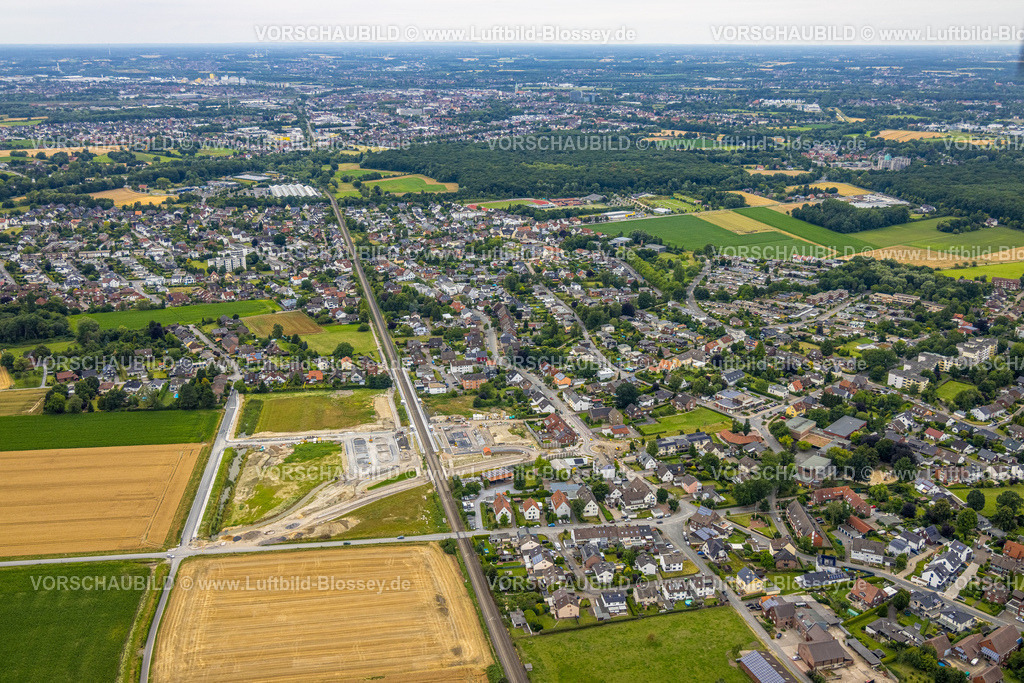 Hamm240710378 | Luftbild, geplante Nahverkehrsverbindung mit Haltepunkt in Westtünnen, Baustelle am Südfeldweg und Von-Thünen-Straße für den künftigen Bahnhaltepunkt, Bahnlinie und Wohnsiedlung, Fernsicht, Stadtbezirk Rhynern, Hamm, Ruhrgebiet, Nordrhein-Westfalen, Deutschland