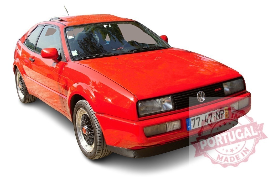 Red Volkswagen Corrado sportscar isolated on white | Red Volkswagen Corrado vintage sportscar displaying its classic coupe design on a white background - Realized with Pictrs.com