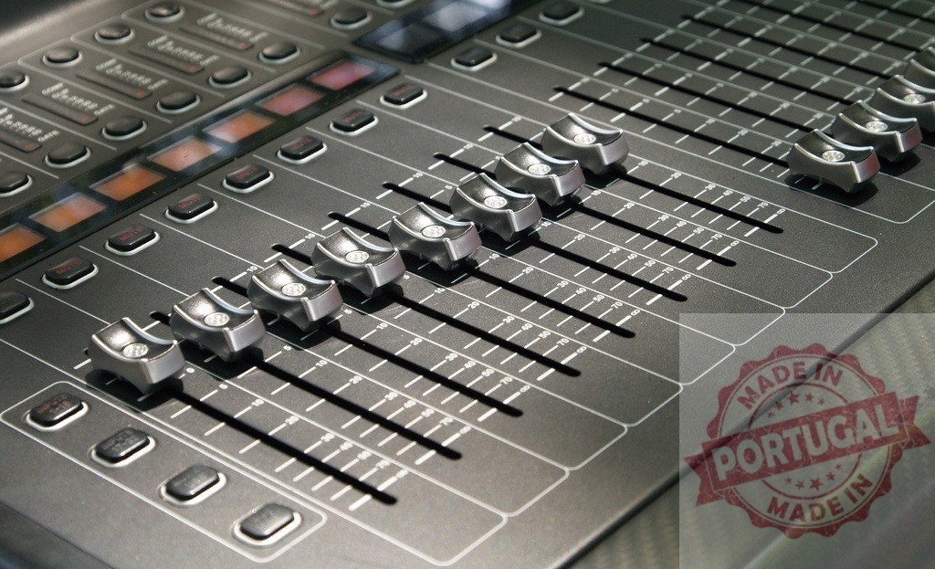 Audio mixer faders controlling sound levels in studio | Professional audio mixer console with faders, buttons, and display for sound engineering - Realized with Pictrs.com