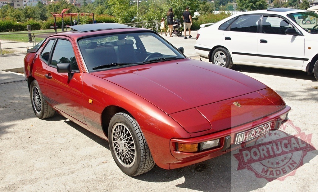 Red Porsche 924 vintage sports car outdoor | Red Porsche 924 parked outdoors, showcasing classic design and automotive heritage - Realized with Pictrs.com
