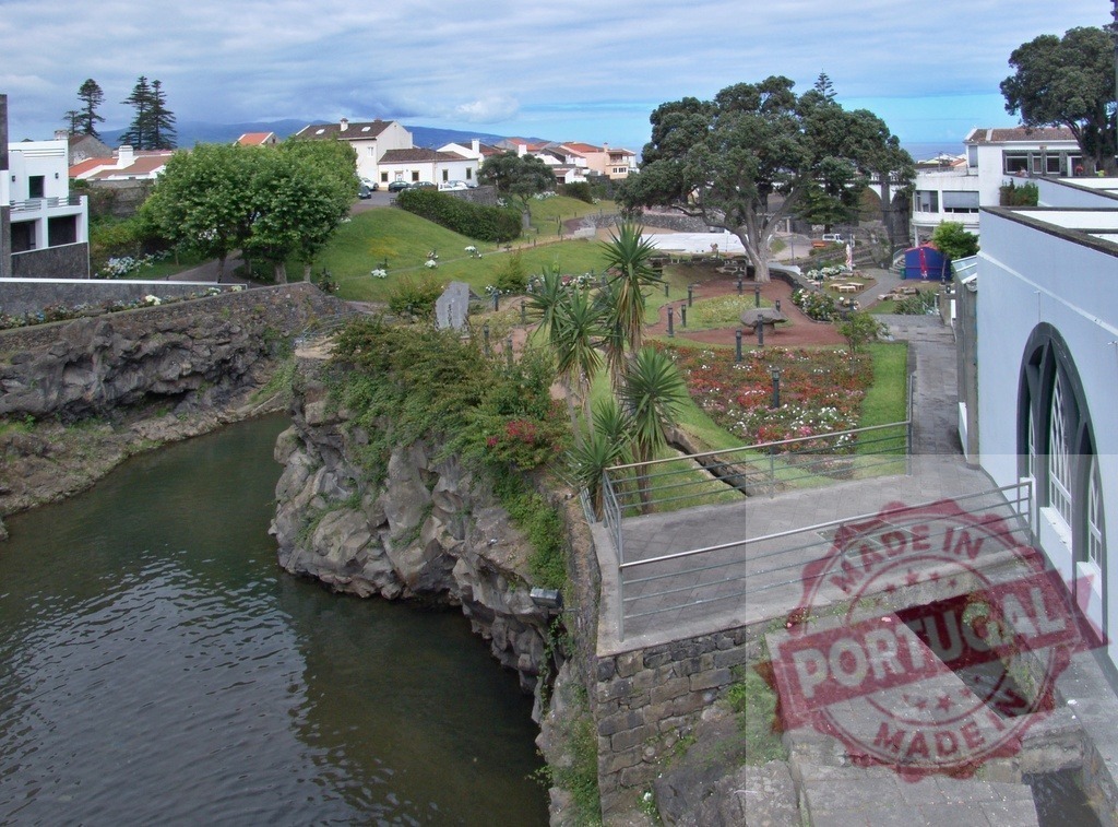 Ribeira Grande city park river landscape | Ribeira Grande city park and river in São Miguel, Azores, showing green gardens and residential buildings - Realized with Pictrs.com