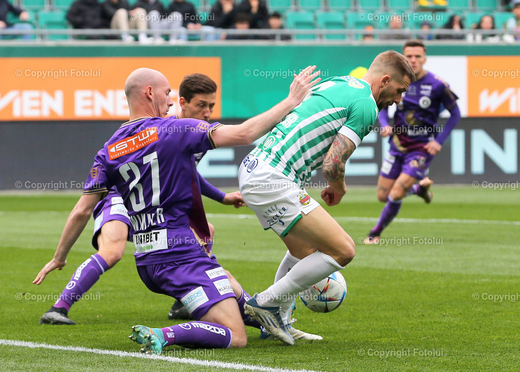 A_LUI_09042023_10 | SPORT,FUSSBALL,ADMIRAL BUNDESLIGA SK RAPID WIEN- AUSTRIA KLAGENFURT 09.04.2023 IM BILD:  NICOLAS WIMMER (KLAGENFURT) UND GUIDO BURGSTALLER (SK RAPID WIEN ) FOTO:FOTOLUI/MW