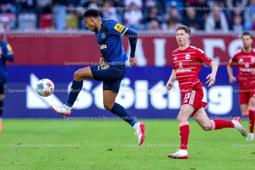 F9510042601022 | 10.04.2026, Fußball, Fortuna Düsseldorf - Holstein Kiel, 2. Fußball Bundesliga, Herren, Merkur Spiel-Arena, 29. Spieltag, Saison 2025 2026: Ikem Ugoh (Holstein Kiel #49) neben Cedric Itten&nbsp;(Fortuna Düsseldorf #13) DFB regulations prohibit any use of photographs as image sequences and or quasi-video.