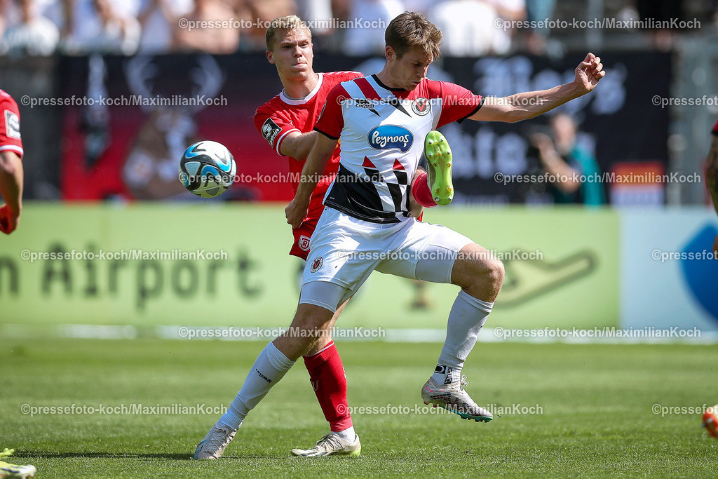 Koe3Liga11052401039 | 11.05.2024, Köln, Fußball, bwin 3. Liga Herren, Sportpark Höhenberg, 37. Spieltag, Saison 2023 2024, FC Viktoria Köln – Jahn Regensburg: Louis Breunig (Jahn Regensburg) gegen Tobias Anselm (Viktoria Köln). 
DFB regulations prohibit any use of photographs as image sequences and or quasi-video.