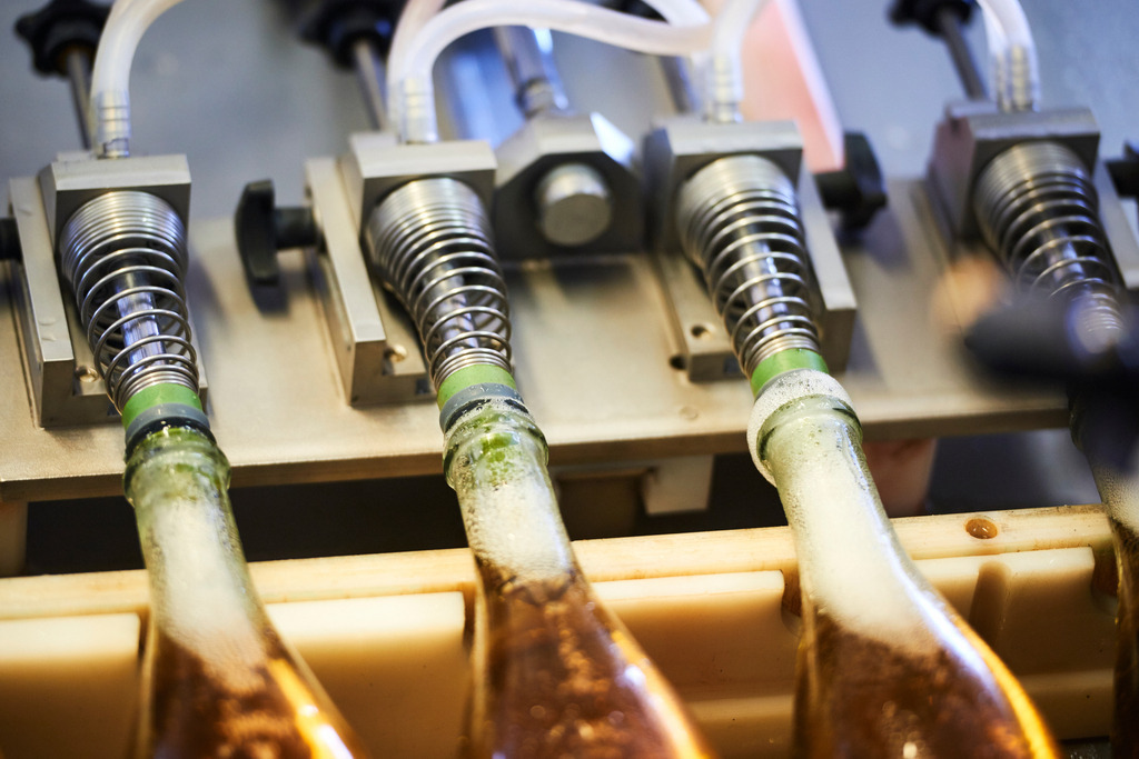 Sektkellerei Szigeti | Gols, Austria - February 19, 2018: Sektkellerei Szigeti; nach dem Degorgieren wird hier die fehlende Menge an Sekt, mit einer kleinen Menge „Liqueur d’expedition“ aufgefüllt, die sogenannte die Dosage. - Realisiert mit Pictrs.com