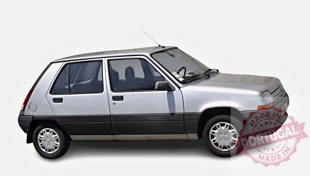 Renault 5 Supercinq showcasing its iconic profile against white background | Silver Renault 5 Supercinq, a symbol of the 1980s, is parked against a white backdrop, emphasizing its compact design and iconic profile - Realized with Pictrs.com