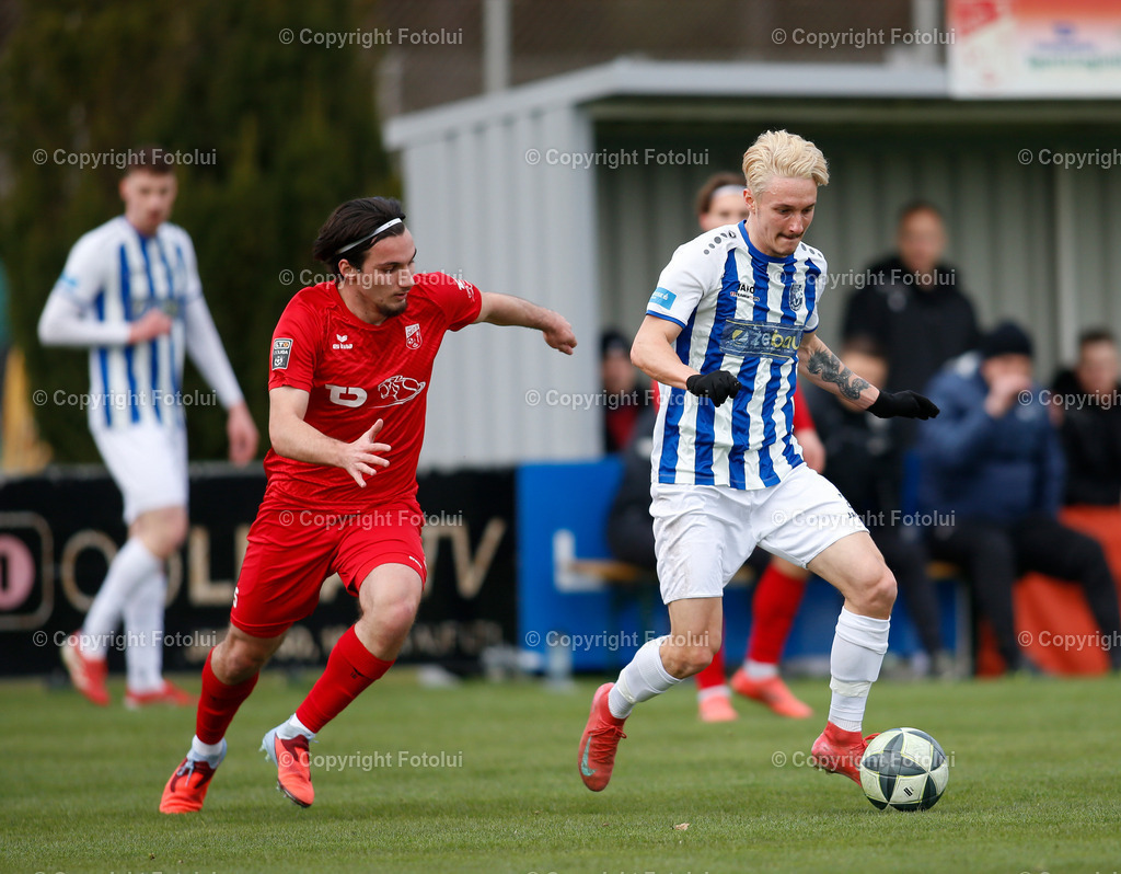 A_LUI_28032026_07 | SPORT,FUSSBALL, LT1 OOE LIGA ASKOE OEDT 1B-SV ZEBAU BAD ISCHL 28.03.2026 IM BILD:  TUNAHAN SAHAN (OEDT1B) UND OLEKSANDR LOVYNIUK (BAD ISCHL) FOTO:FOTLUI 