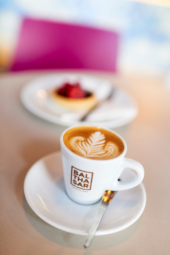 Kaffee Balthasar | Wien, Austria - August 11, 2017: Kaffee Balthasar, Schokotoertchen mit Fruechte und Melange. - Realisiert mit Pictrs.com