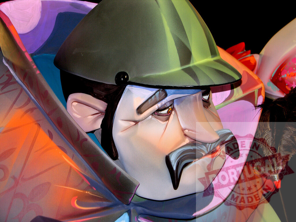 Fallas festival intricate colorful sculpture head. Fallas Fiestas Communidad Valenciana | Intricate caricature sculpture of a man's head, part of a falla during the Fallas festival - Realisiert mit Pictrs.com