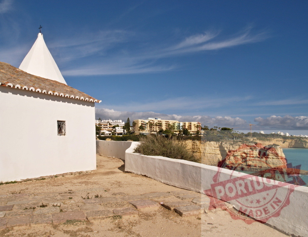 Nossa Senhora da Rocha chapel overlooking Algarve coastline | Whitewashed chapel on cliffs finding ocean views and coastline architecture under a blue sky - Realized with Pictrs.com