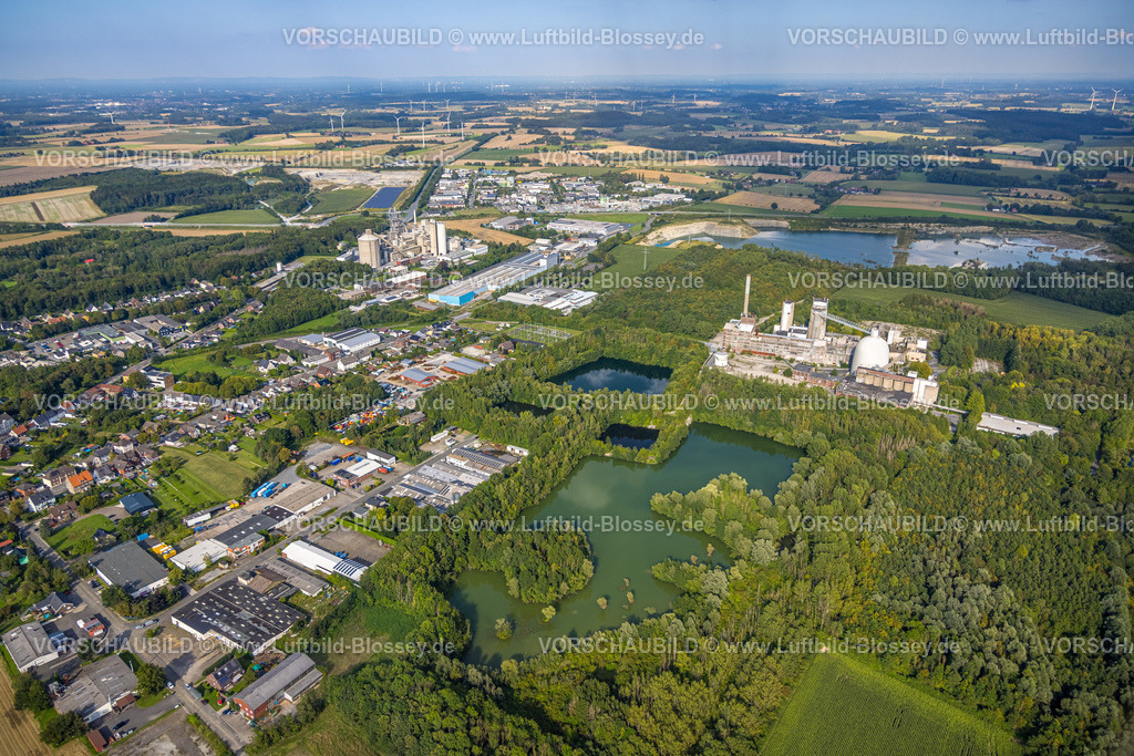 Beckum230805027 | Luftbild, Zementwerk Mersmann im Waldgebiet, im Hintergrund Phoenix Zementwerke Krogbeumker GmbH, Beckum, Münsterland, Nordrhein-Westfalen, Deutschland