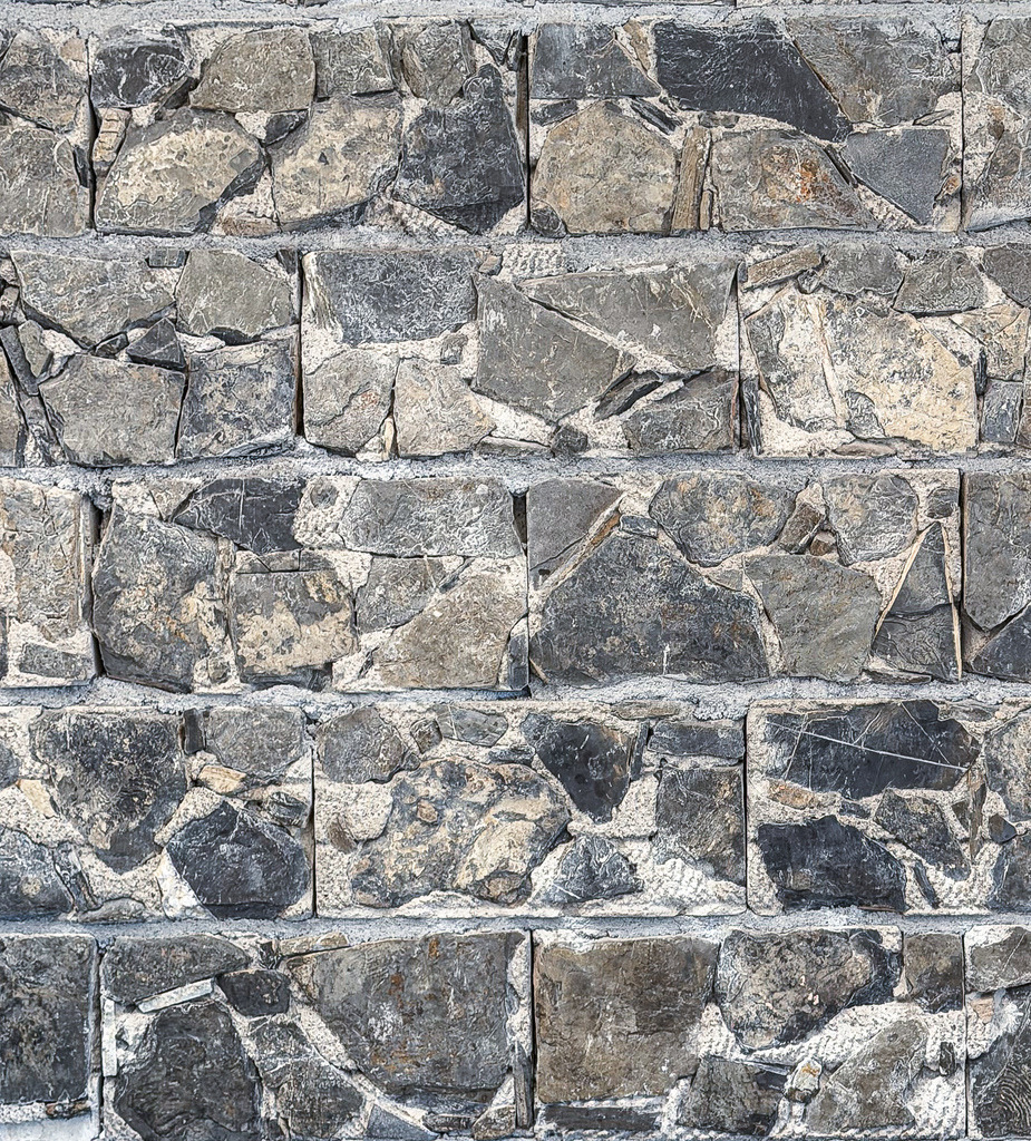 Naturstein & Geometrie – Abstraktes Struktur-Wandbild | er spannende Kontrast zwischen Natur und moderner Architektur. Diese kontrastreiche High-End-Fotografie fängt die raue, lebendige Textur einer Natursteinwand in Kombination mit strenger, urbaner Geometrie ein. Das faszinierende Spiel aus Licht, Schatten und organischen Formen bringt eine kraftvolle, erdende und gleichzeitig hochmoderne Atmosphäre an deine Wände. Ein exklusives Highlight als großformatiger Fine Art Print, rustikales Leinwandbild oder hinter mattem Acrylglas für minimalistische Lofts, moderne Wohnzimmer oder repräsentative Büros. - Realisiert mit Pictrs.com