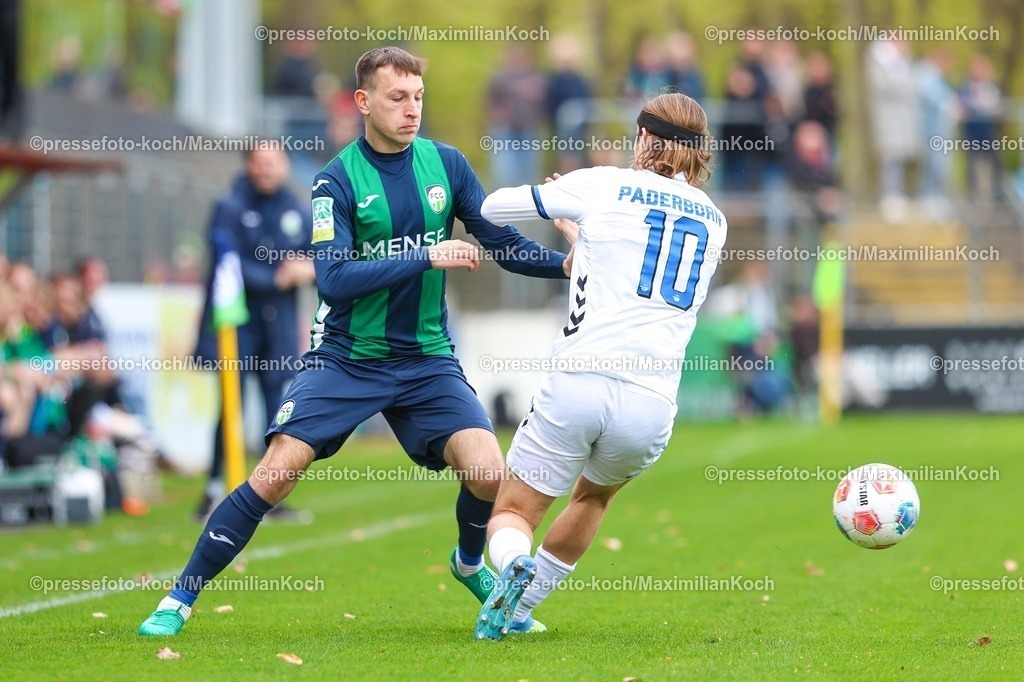 xKWIx12042601019 | 2026.04.12, xkwix, Fußball, Regionalliga West, FC Gütersloh -  SC Paderborn 07 II, Heidewaldstadion (Ohlendorf Stadion im Heidewald), 29.Spieltag, Saison 2025 / 2026: Fynn Arkenberg (FC Gütersloh #33) im Zweikampf gegen Bennit Broeger (SC Paderborn II #10) DFB regulations prohibit any use of photographs as image sequences and or quasi-video. Photo: xKamilxWilkowskixPressefotoKochx