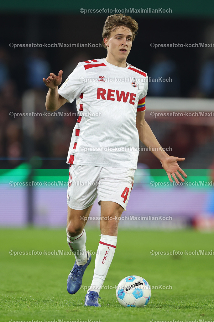 1FC04122403212 | 04.12.2024, Fußball, 1. FC Köln - Hertha BSC, Achtelfinale DFB-Pokal, RheinEnergieSTADION, Saison 2024 2025: Timo Hübers (1.FC Köln #4)DFB regulations prohibit any use of photographs as image sequences and or quasi-video.