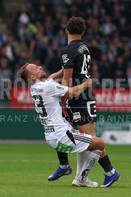 SK Puntigamer Sturm Graz vs TSV Egger Glas Hartberg – Championship Group    | Graz, Austria, 12.Apr.26 - SOCCER - ADMIRAL Bundesliga, SK Puntigamer Sturm Graz vs TSV Egger Glas Hartberg. The image shows Tobias Kainz (Hartberg) and Jacob Peter Hoedl (STU).    